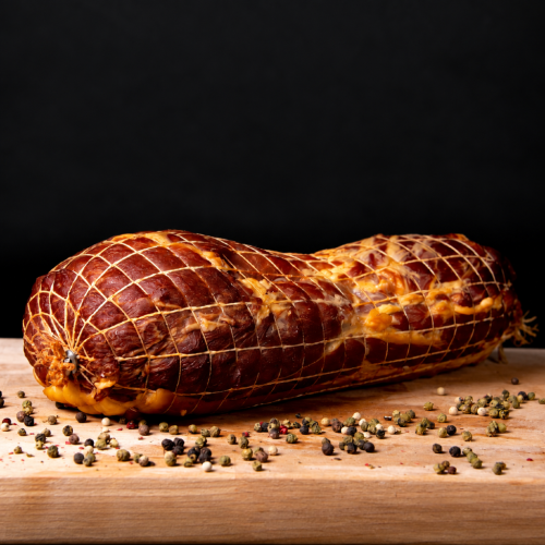 Węgierska szynka ze skórą wędzona w siatce ok. 1,5kg – Szilváshús